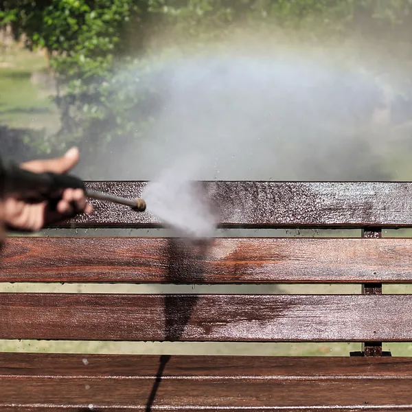 powerwashing a bench